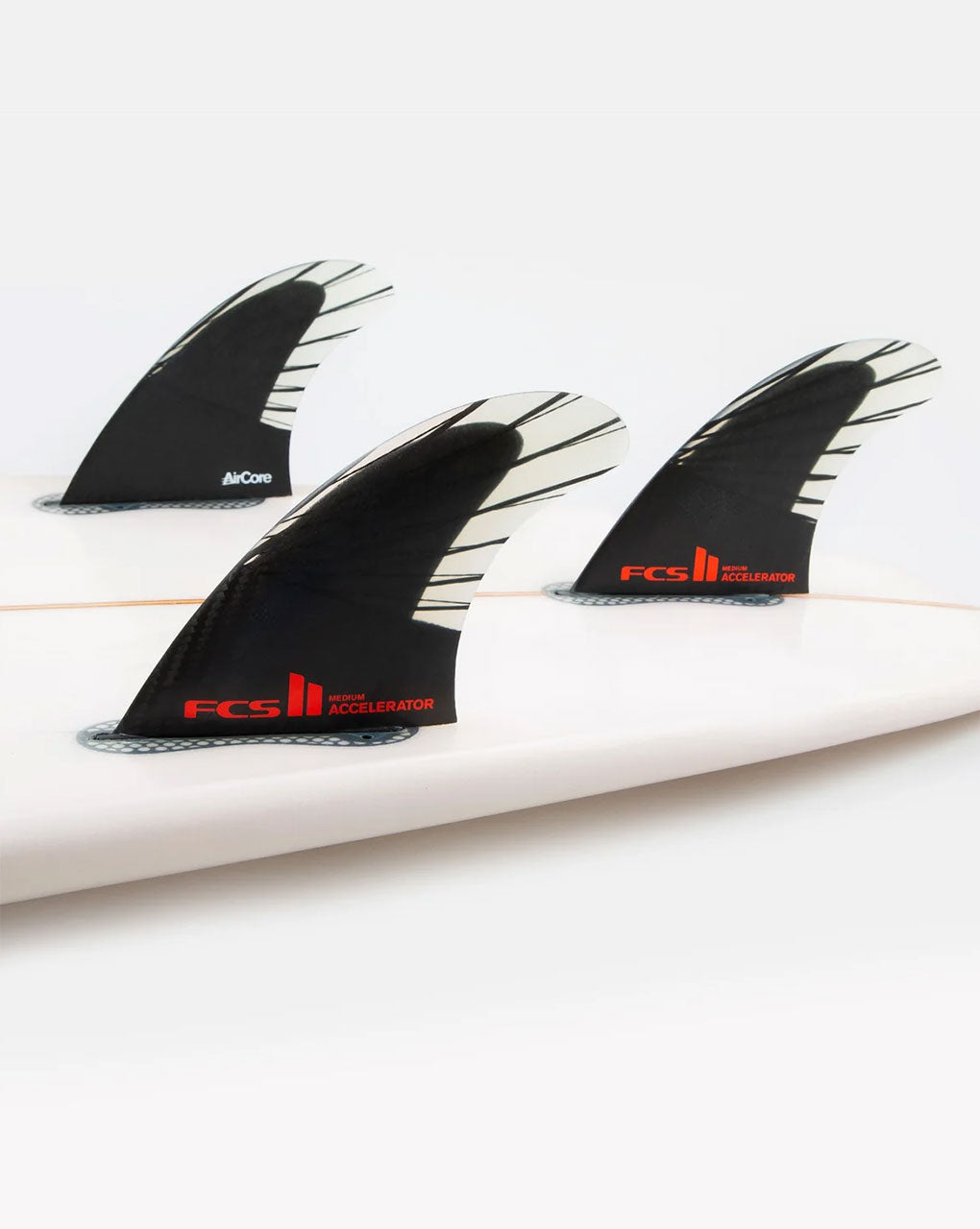 FCS II ACCELERATOR MEDIUM TRI FINS PC CARBON+AIR CORE